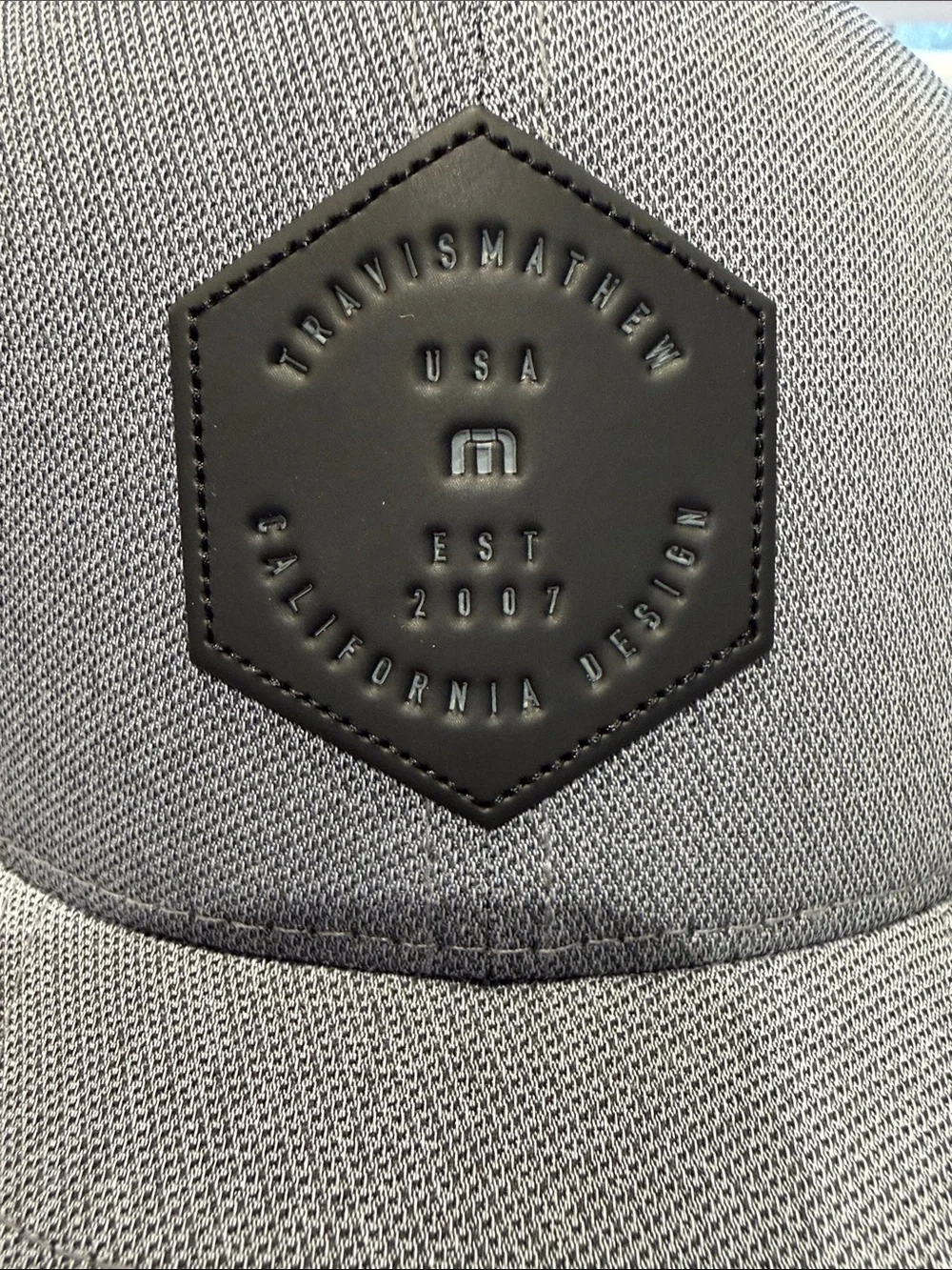 Travis Mathew Gray Flexfit Cap with Black Hex Patch